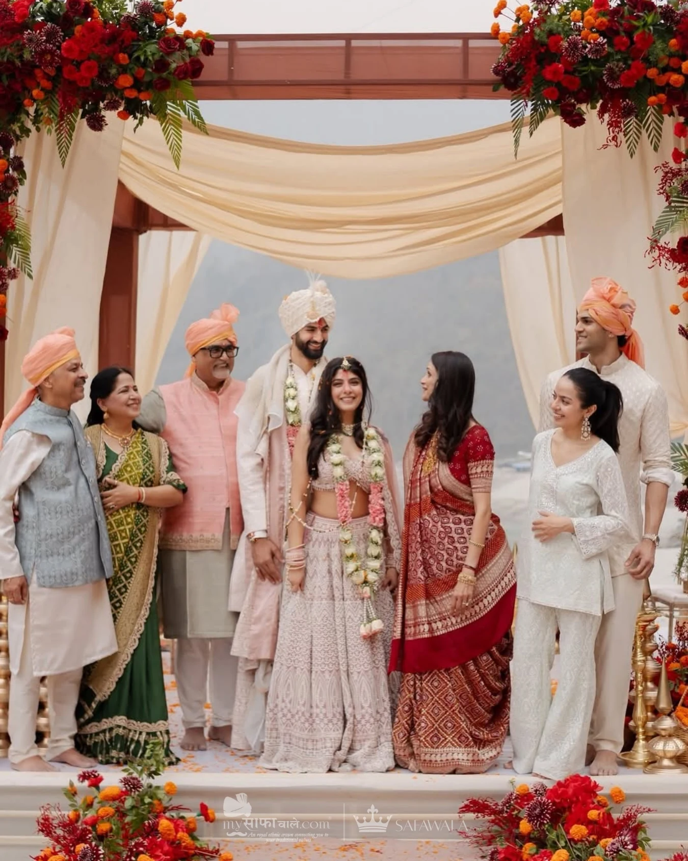 Royal red wedding safa and embroidered groom styling for Begumpet
